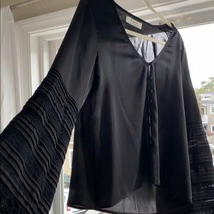 Silk black bell sleeved blouse